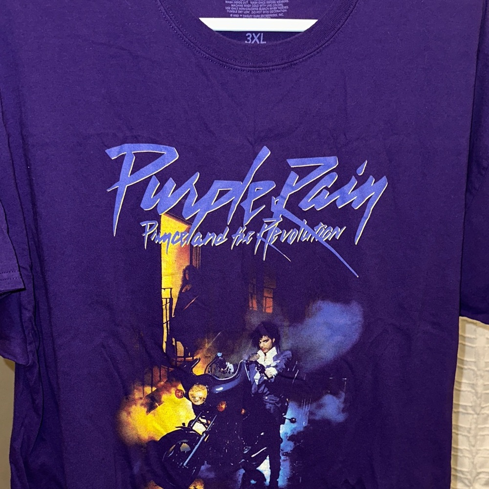 Purple Graphic Tee with Iconic Design